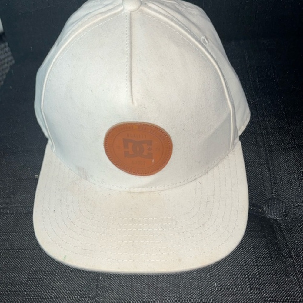 Kids off white colored DV shoes snap back hat some signs of wear see pics.